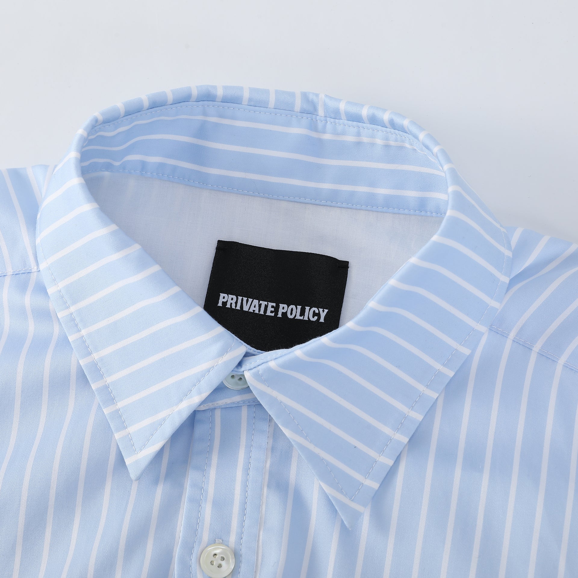BUBBLE HEM CROPPED SHIRT
